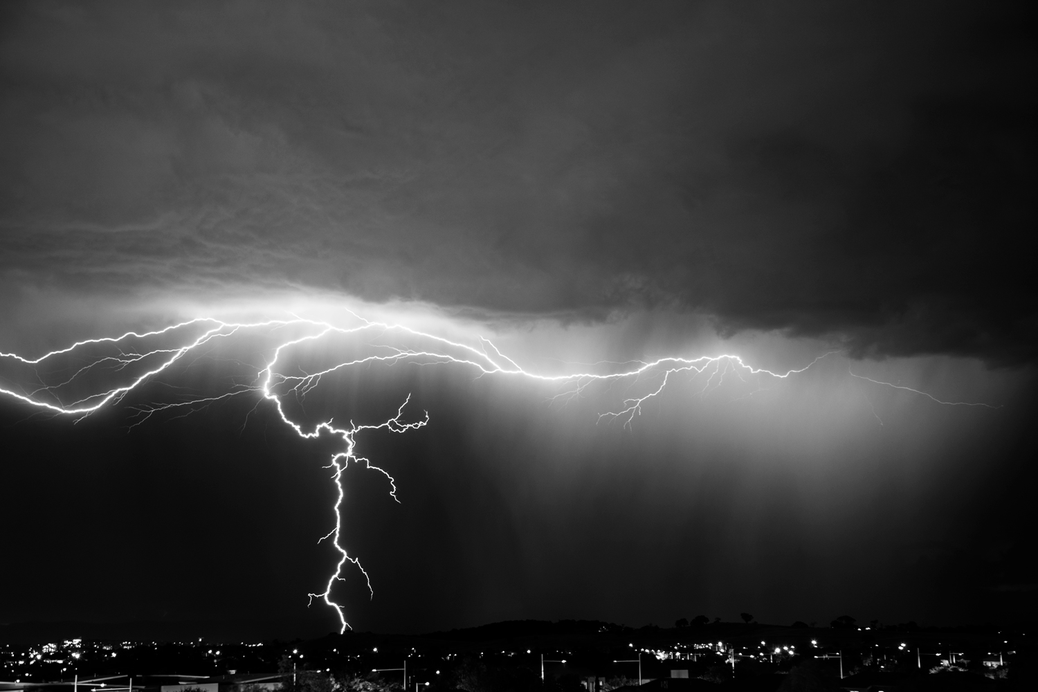 lightning striking above a city